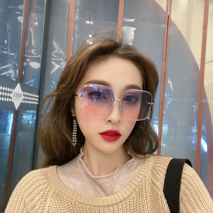 Rimless cut square sunglasses for women